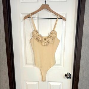 Brand New Lizette Collection Cream/tan colored body Suit